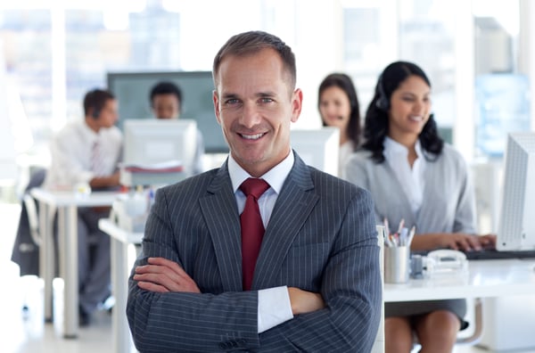 bigstock-Smiling-Manager-Leading-His-Te-6066880