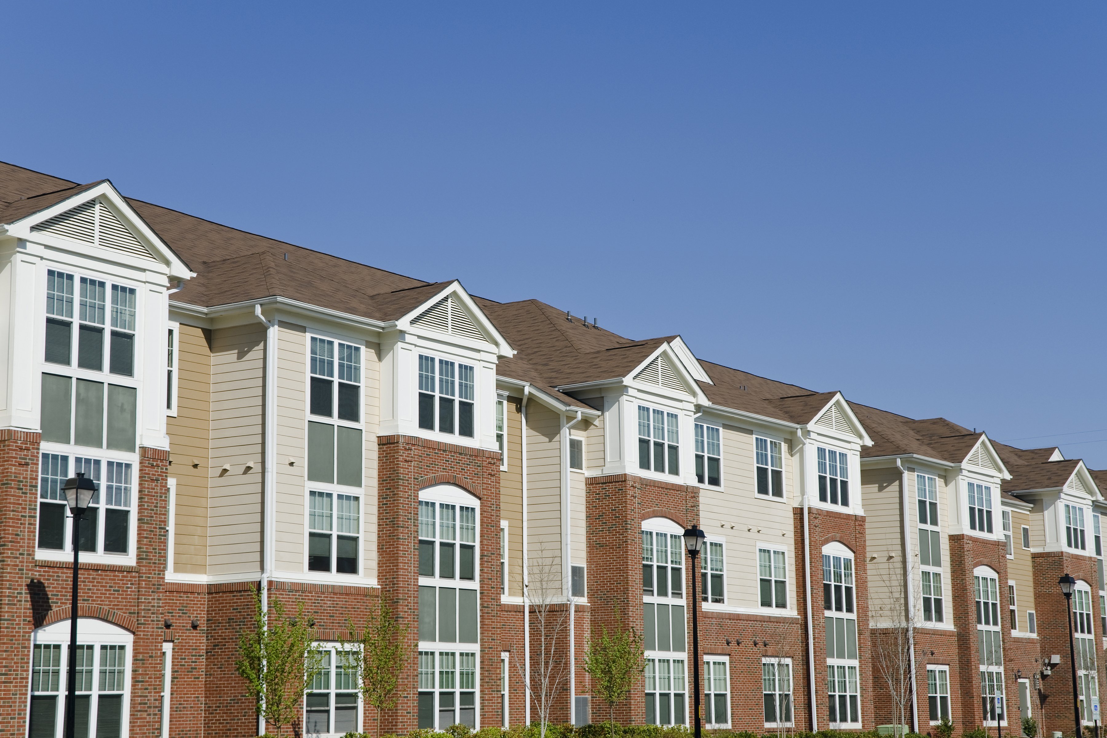 bigstock-Suburban-apartment-building-17797427