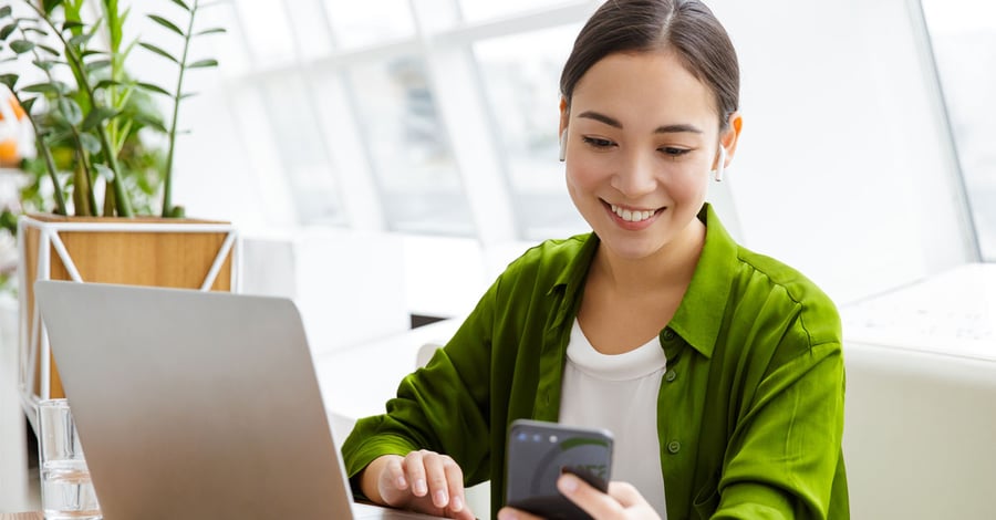 woman-smiling-on-mobile-phone-1